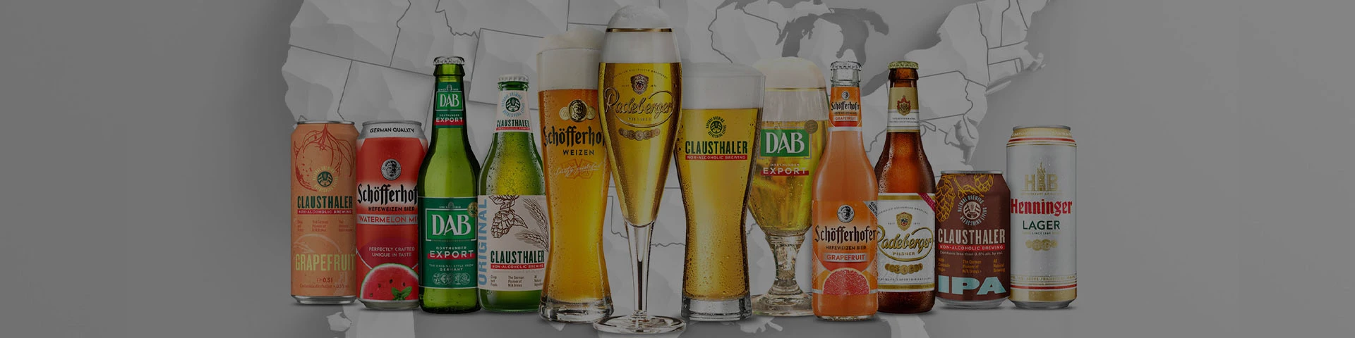 Various beer bottles and glasses filled with beer are displayed against a grey background.